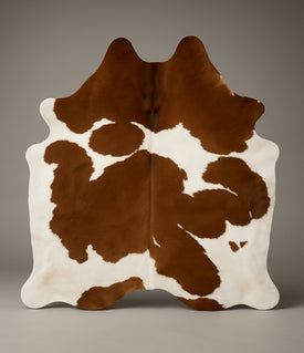 Cowhide rug Brown and White